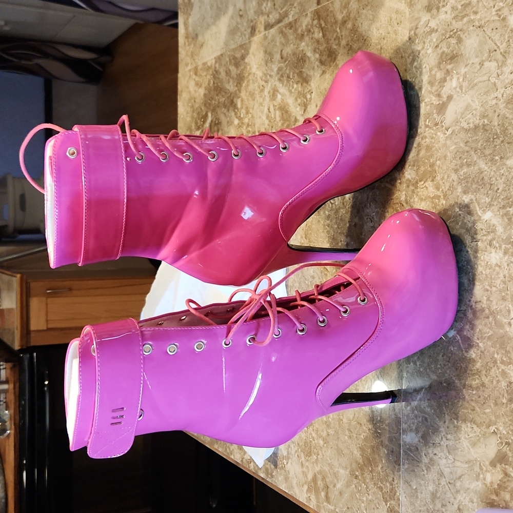 Hot pink high heel boots